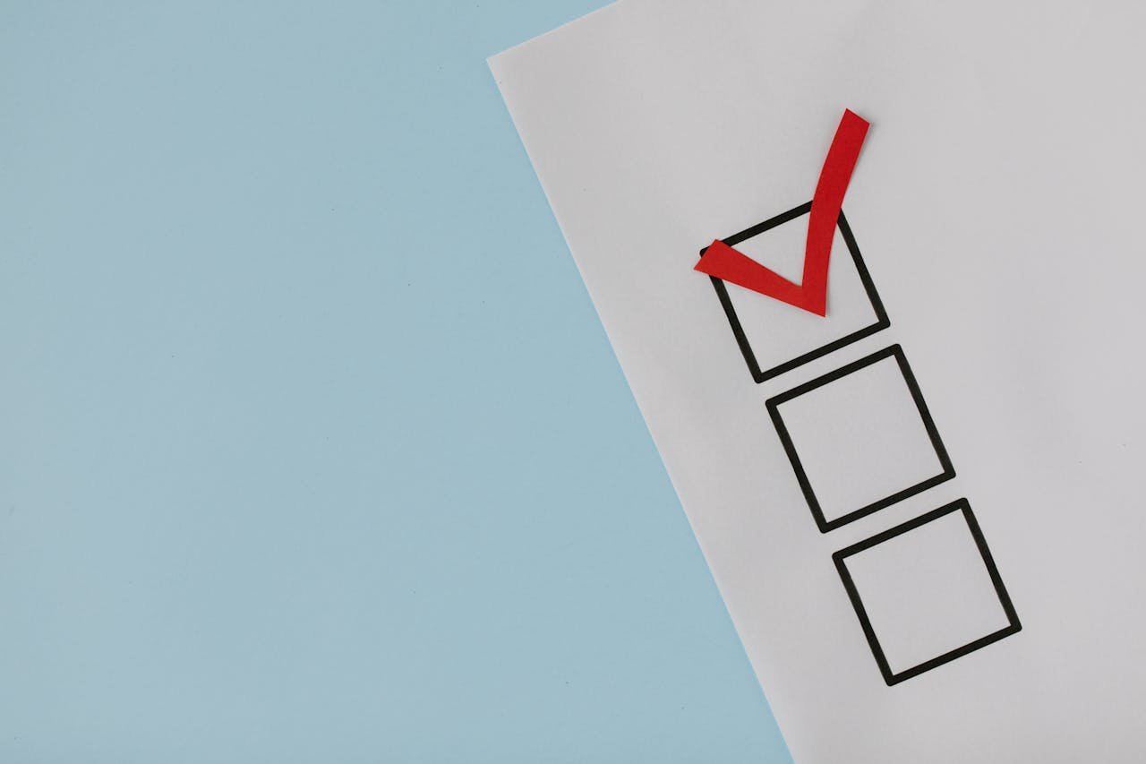 services-08 A simple white paper checklist with one red checkmark, ideal for concepts like completion or approval.